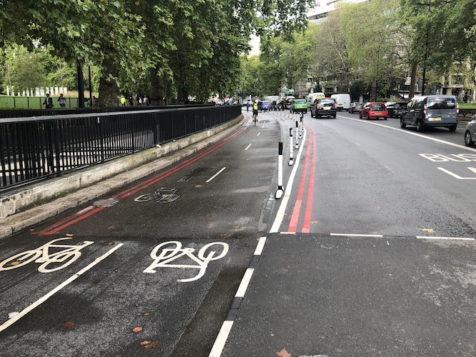 How many bicycles travel along Park Lane and how many used to?